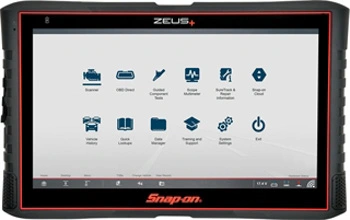 Flagship Diagnostic auto scan tool, ZEUS+™, is presented front and center between two technicians.